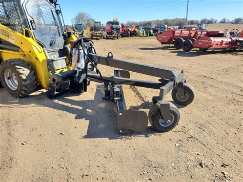 kubota skid steer road grader attachment|kubota ignite attachment.